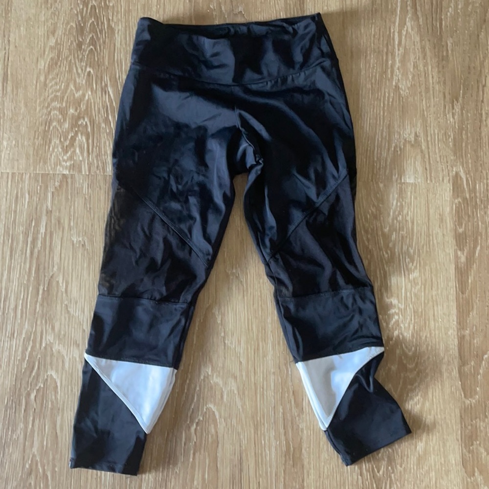Black leggings with mesh and white detailing